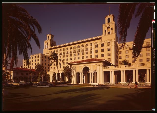 Ream General Hospital Multi-story white Renaissance Revival style hotel building with two towers, arched windows, and columns in pairs.