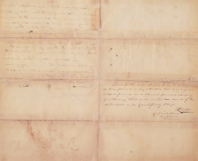 manumission paper handwritten by Col. Frederick Dent attesting to Robert Green's freedom.