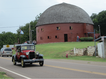 A large round building with a thatched roof.