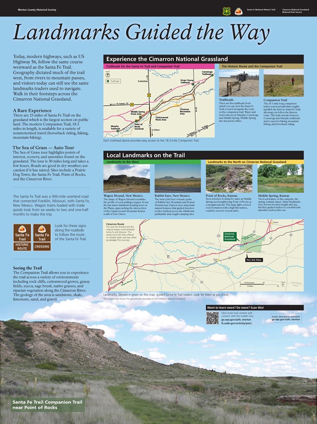 lt= A large kiosk sign with maps and text about Morton County Santa Fe trail site.