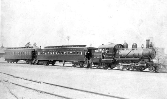 a vintage train sits on a track