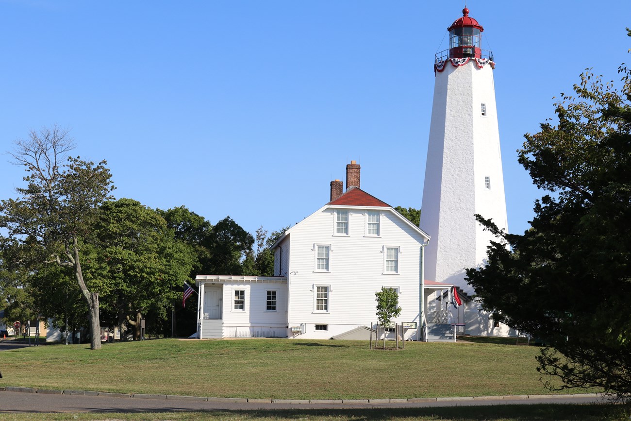 Sandy Hook Light Lighthouse with red white and blue bunting