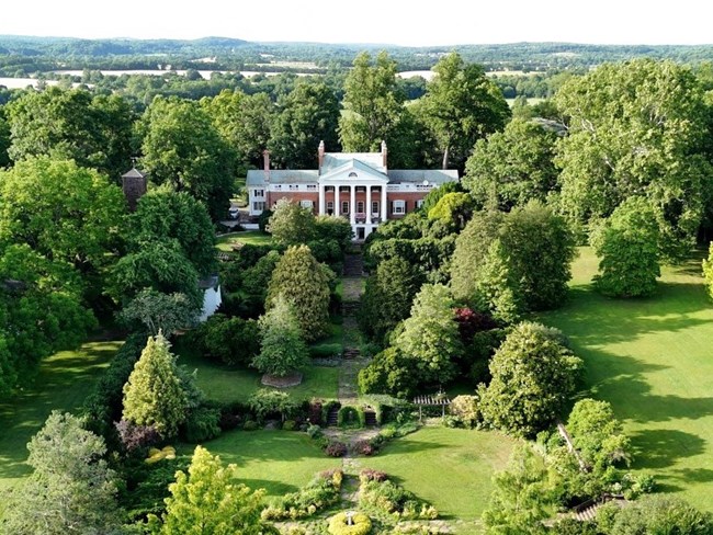 Country manor with wide front yeard