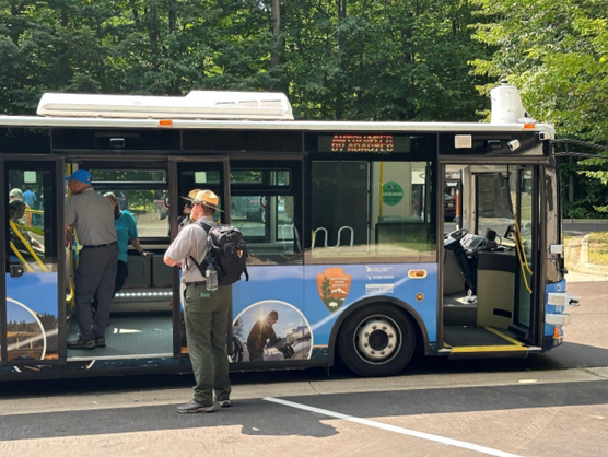 Automated electric bus at Sleeping Bear Dunes National Lakeshore Automated electric bus parked in parking lot at Sleeping Bear Dunes National Lakeshore