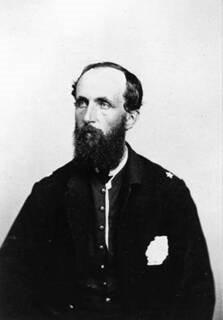Samuel Jennison MHS A black and white photograph of Jennison with jacket unbuttoned and open.