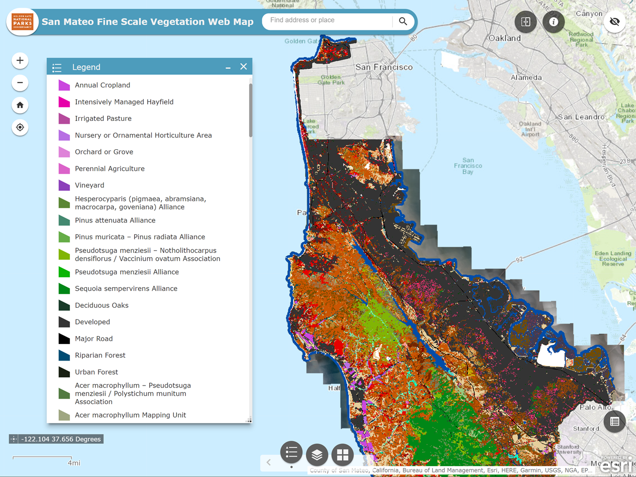 Screenshot of an interactive web map titled 'San Mateo Fine Scale Vegetation Web Map.' The map legend is open on the left, with color blocks representing land cover classes corresponding to an intricate map centered on San Mateo County to the right.