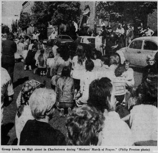 Screenshot 2024-05-15 135735 b Mothers kneel in the street surrounded by police