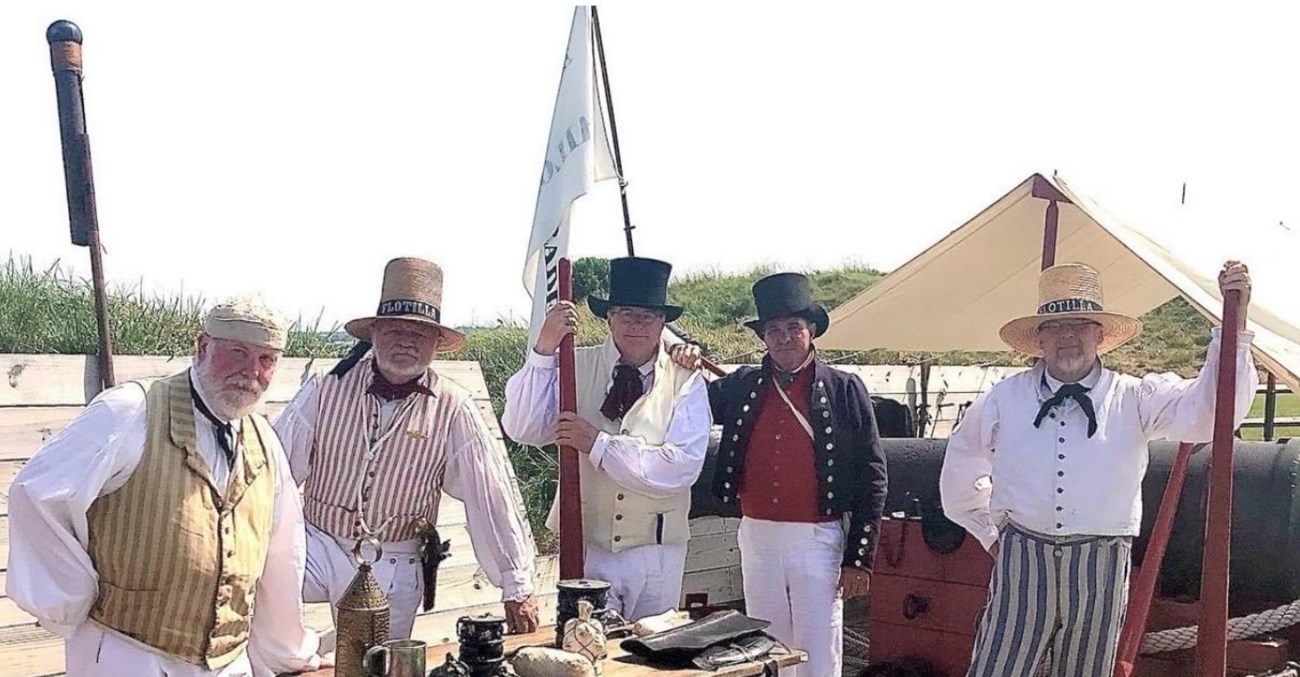 Living historians Five Living historians lined up at the water battery