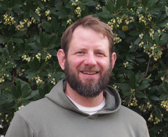 Sean Smith Smiling face of bearded man.