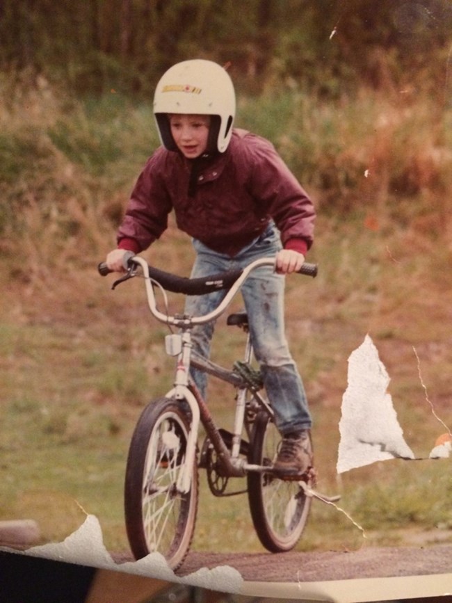 Sean on bike Boy riding his bike.
