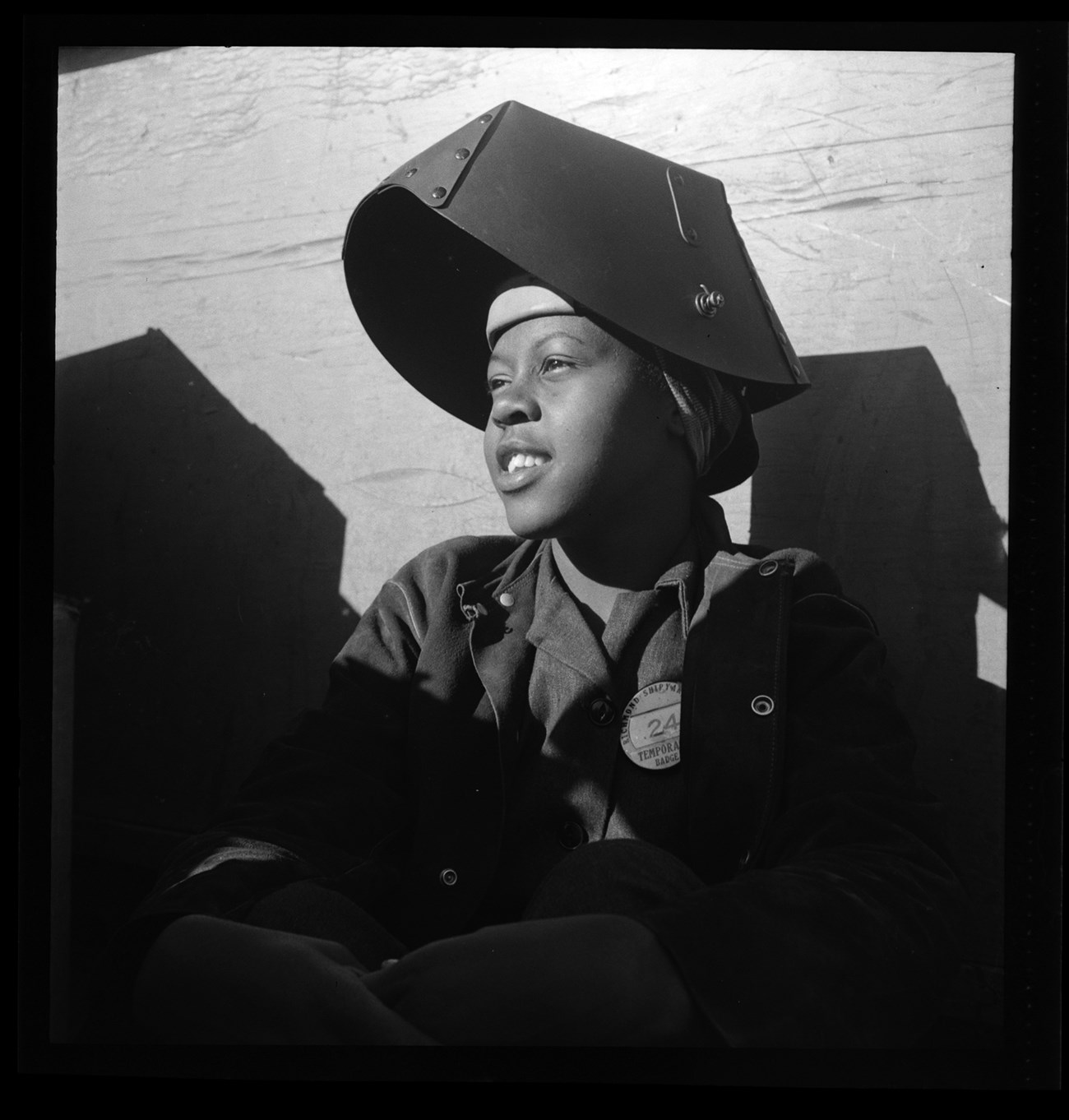 Shipyard Worker, Richmond, CA, Circa 1943 by Dorothea Lange Portrait of young African American woman in welder’s helmet.