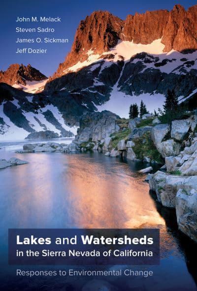 Book cover photo shows view of a stunning lake basin, with the late day sun reflected on cliffs and snowfields on far side of lake. Book title and author names are shown.