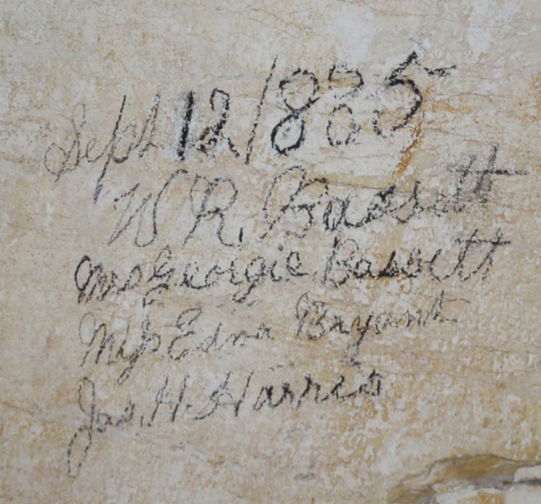 Signatures in the cave 1885 Signatures by the Bassetts and others on a cave wall.