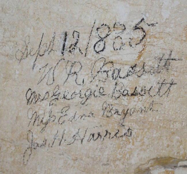 Signatures in the cave 1885 Signatures by the Bassetts and others on a cave wall.