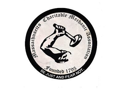 MassachusettsCharitableMechanicAssociationLogo Logo of the Massachusetts Charitable Mechanic Association that has an arm holding up a hammer.