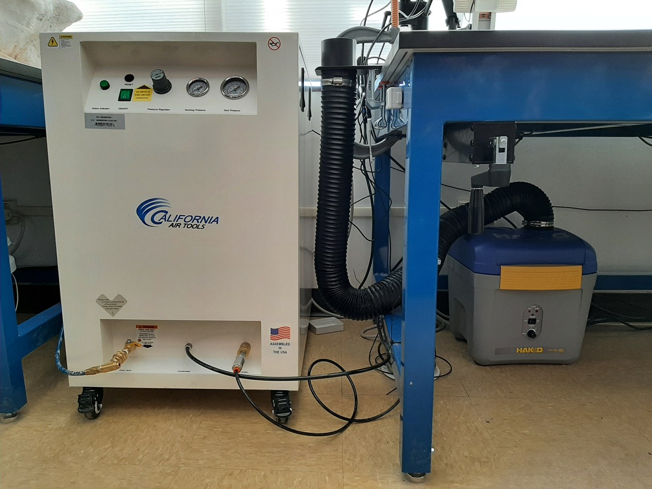 Spring2022_Photo5_DMB photo of an air compressor and dust collection system