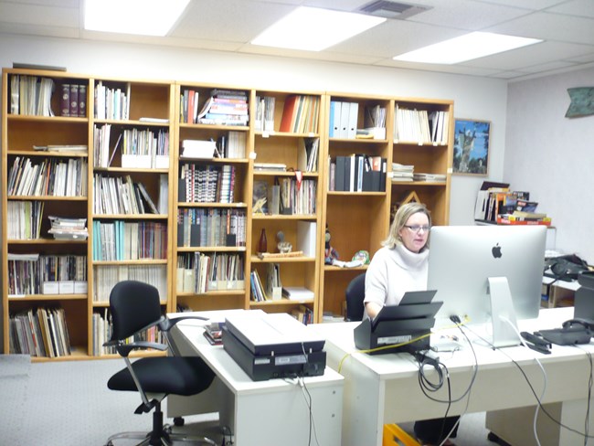 Stacy Mueller, archivist, working in the SPACES offices in Aptos, CA. Stacy Mueller, archivist, working in the SPACES offices in Aptos, CA.
