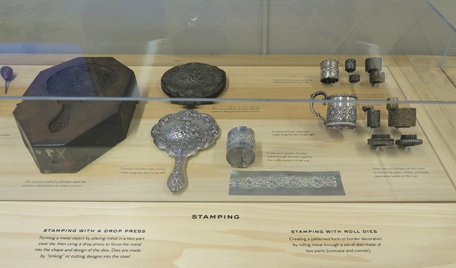 Display showing silver stamping techniques.