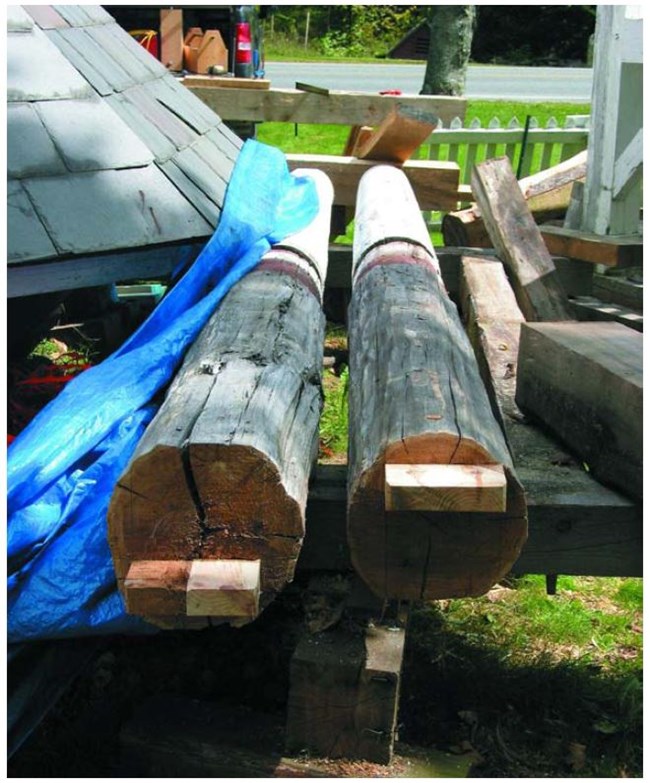 End of two round post with repaired tenons.