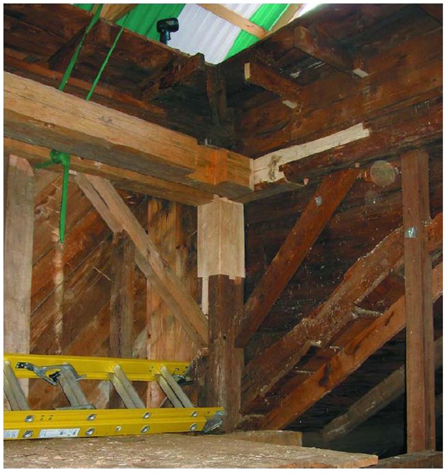 Light colored wood marked the location of repaired scarf joints.