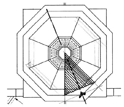 Three concentric octagon shapes around a smaller central decorative octagon. A triangle with an arrow the lower right.