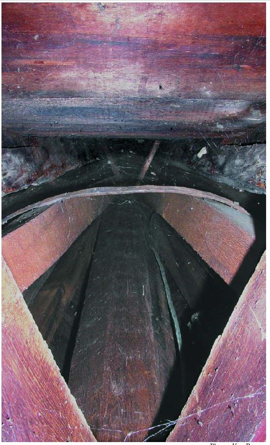 View of timber posts looking up into the spire