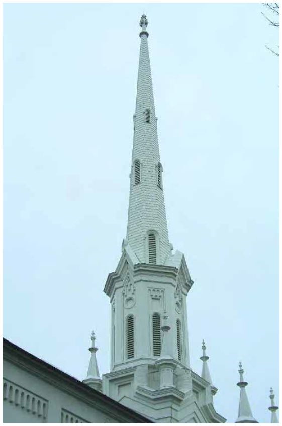 185-foot-tall white steeple with a decorative base and multiple vents evenly spaced on three even levels toward the top.