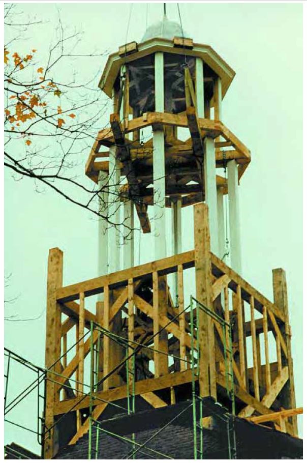 Framework of the full steeple in place on the roof.