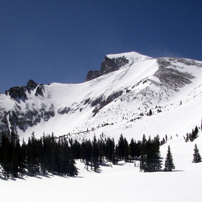 Snow covered mountain peak.