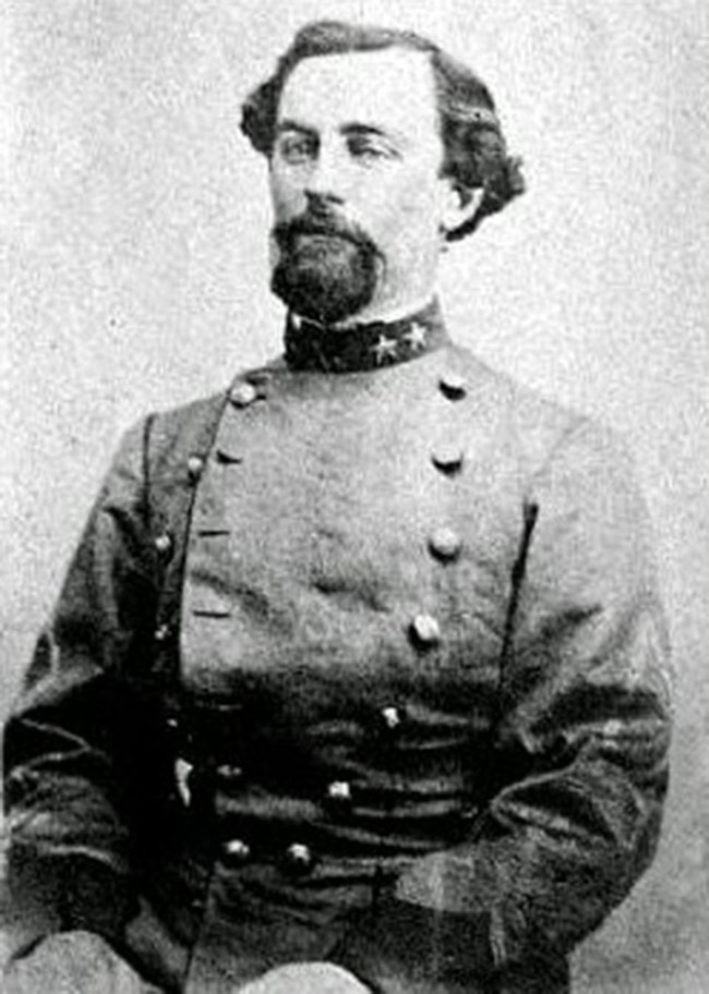 Photograph of Stephen Elliott Jr. seated in military uniform