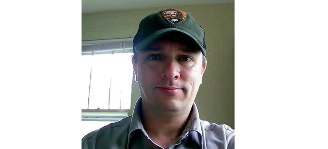 Headshot of a man in NPS uniform