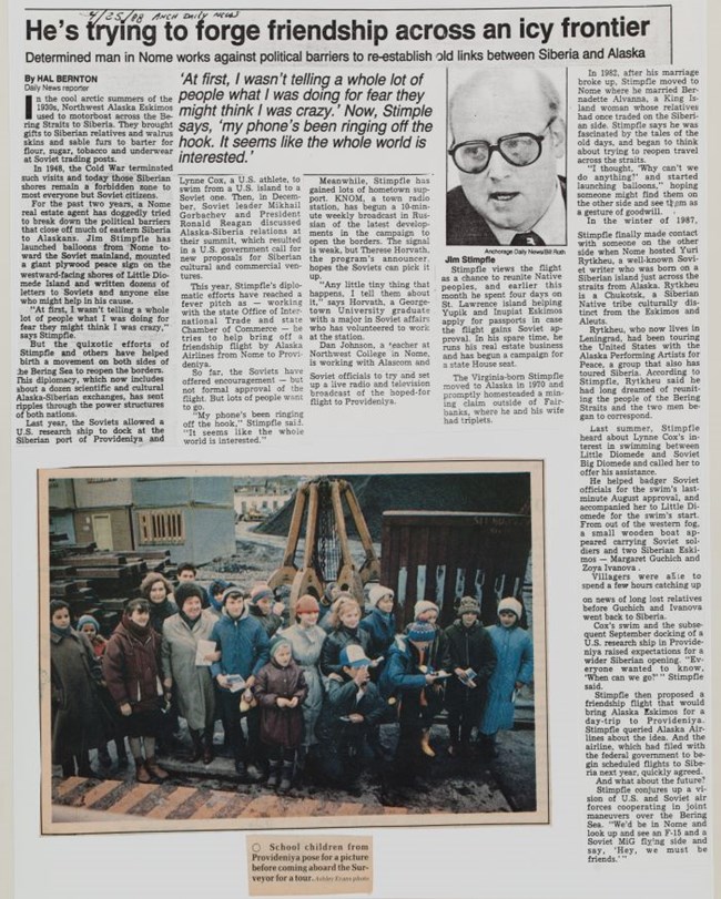 A newspaper clipping shows a man wearing a suit and glasses.