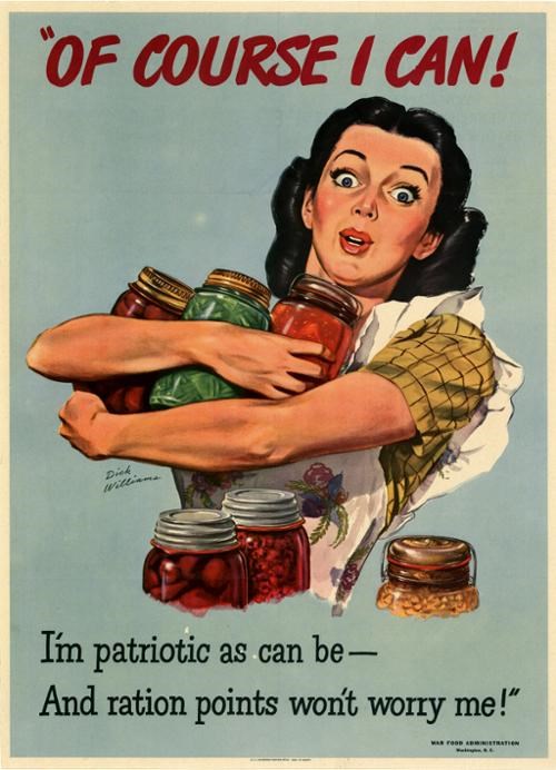 A dark-haired woman with a wide-eyed expression holds three large glass jars of vegetables in her arms. Three more jars can be seen at the lower area of the picture. The woman wears a ruffled apron.