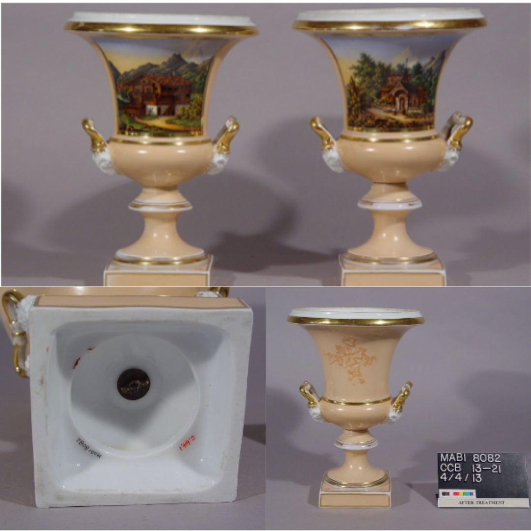 Swiss chalet Two peach bell like vases with attached square base and painted scenes of Swiss chalets and Ivy.