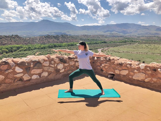 A Park Ranger demonstrates Roadrunner pose at Tuzigoot Pueblo. A Park Ranger demonstrates Roadrunner pose at Tuzigoot Pueblo.