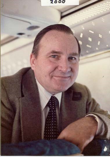 an older man in a suit jacket