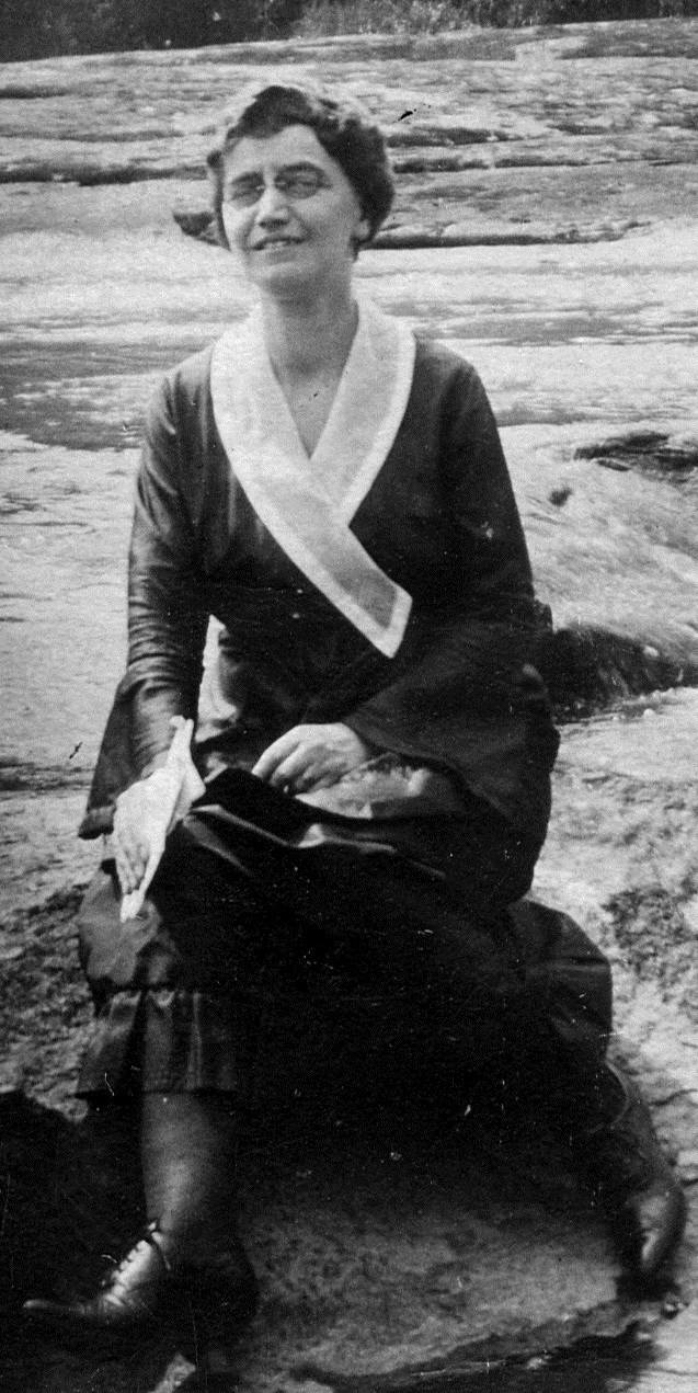 Tench, Edith Rose.2745 A woman, seated, outdoors, in the early 1900s