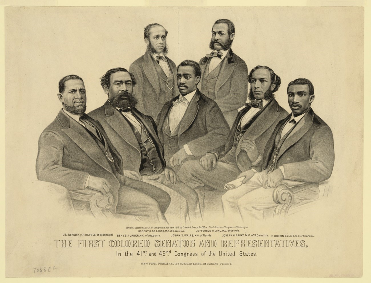 Seven African American men sitting together and wearing suits and bow ties. Text reads "The First colored Senator and Representatives."