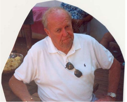 an old white man in a white collared shirt