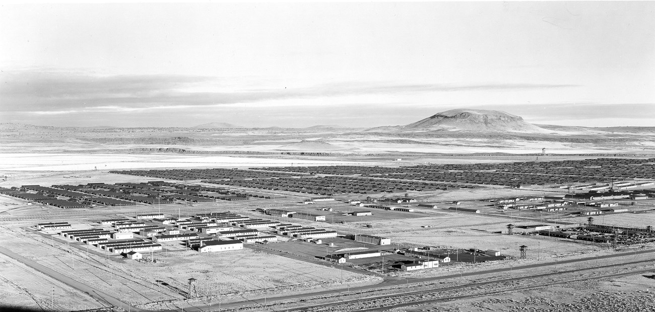 Tule Lake Segregation Center in 1946 Courtesy of WRA Historic black and white photo of a large camp complex in a high desert