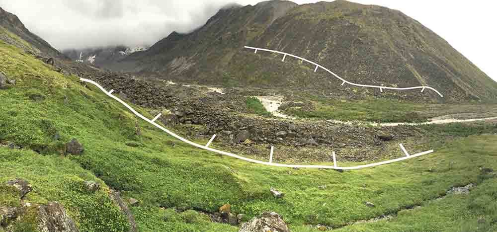 A photo of a glacial morraine with highlighted boundary.