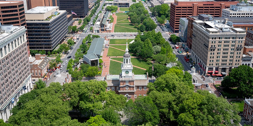 Aerial view of Independence Hall Aerial view of Independence Hall with green grass and red brick sidewalks.