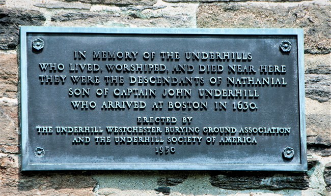 Underhillplaquebytom Metal plaque, set into a masonry wall
