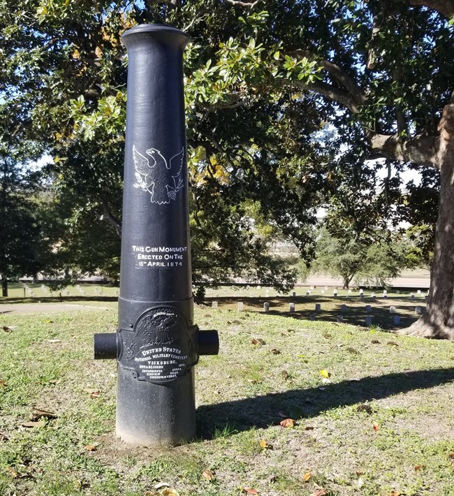 Cemetery cannon near Ross Landing victims.