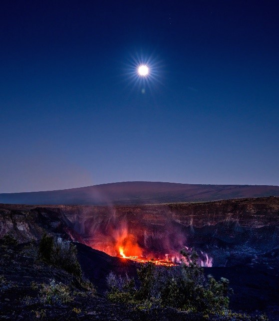 Full moon above Mauna Loa and Kīlauea volcanoes The full moon lights large portions of the caldera that are normally not visible on a dark night.
