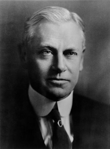 Black and white portrait of Stephen T. Mather in a suit.