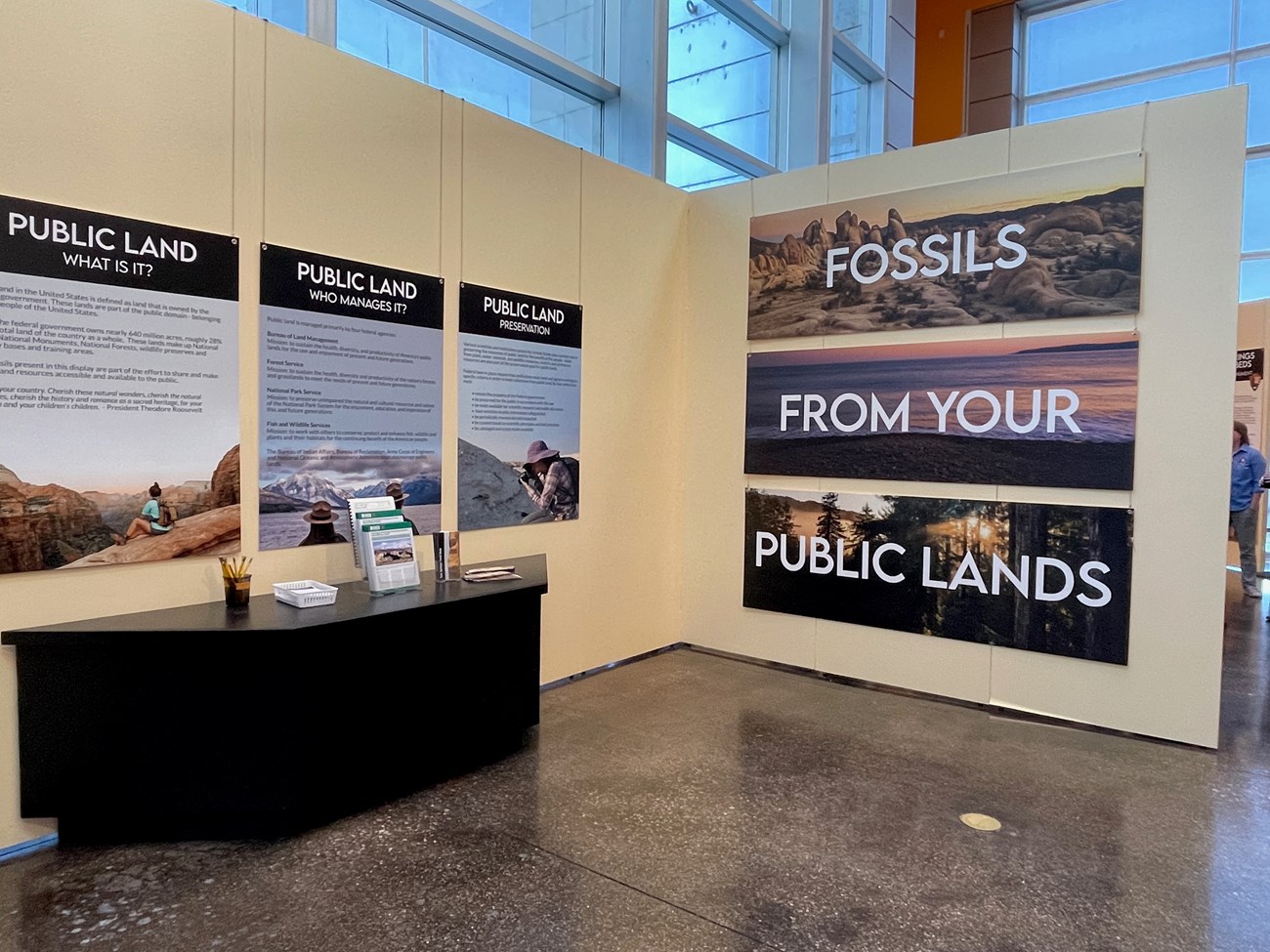 Photo of visitor center signs, "Fossils from your public lands".