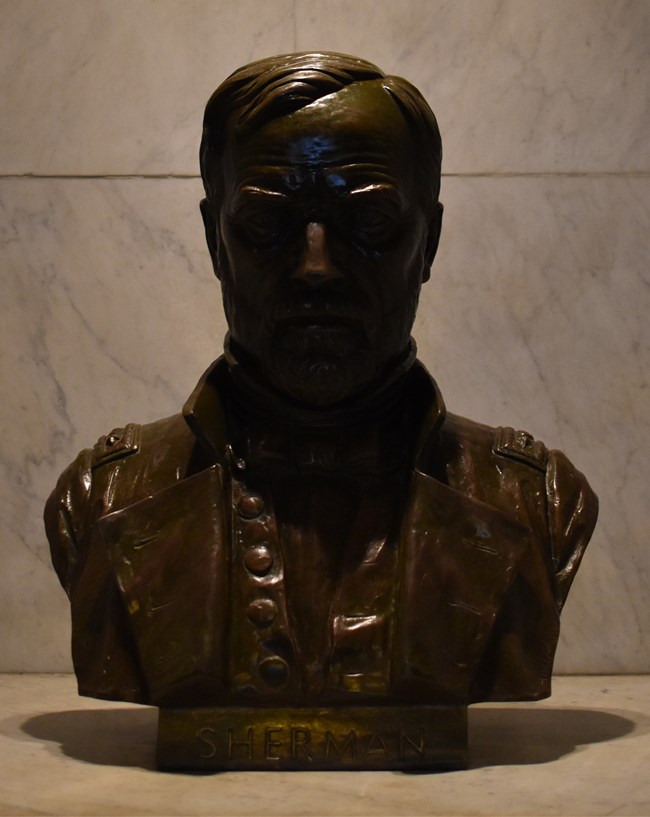 Bronze statue of a man's head