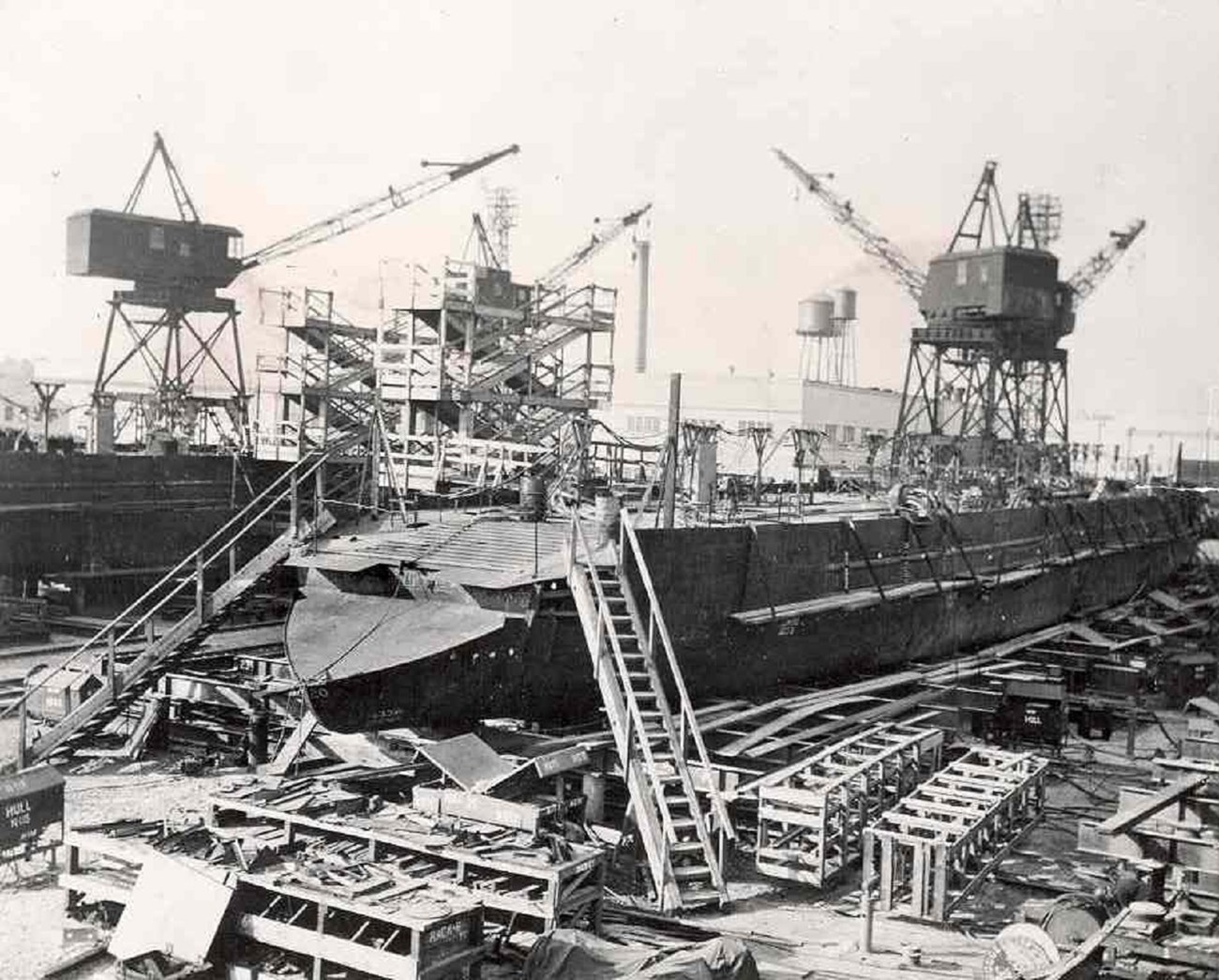 Landing Ship, Tank (LST) under construction at the Dravo Shipyard black and white photo of large military ship under construction during world war 2