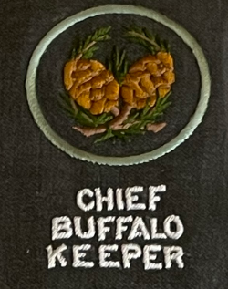 Round patch with two Sequioa cones and "Chief Buffalo Keeper" below